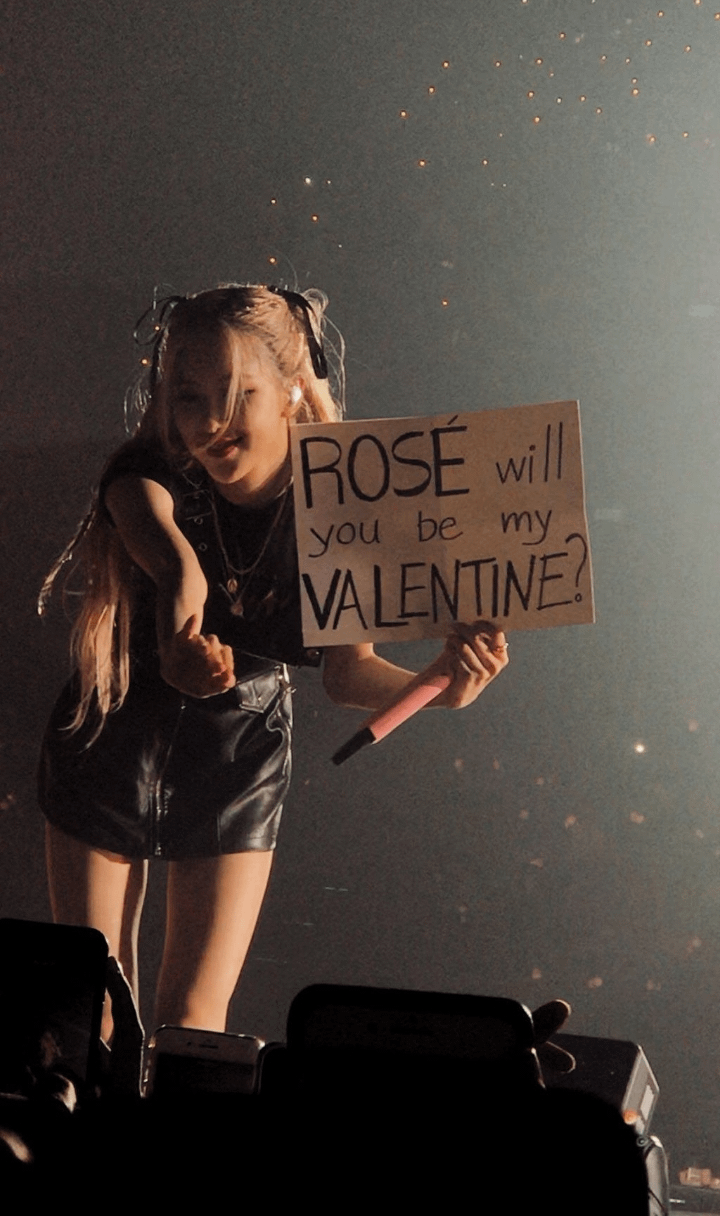 One blink boy say to ease by giving her a big paper in which he wrote "Rose will you be my valentine ?"